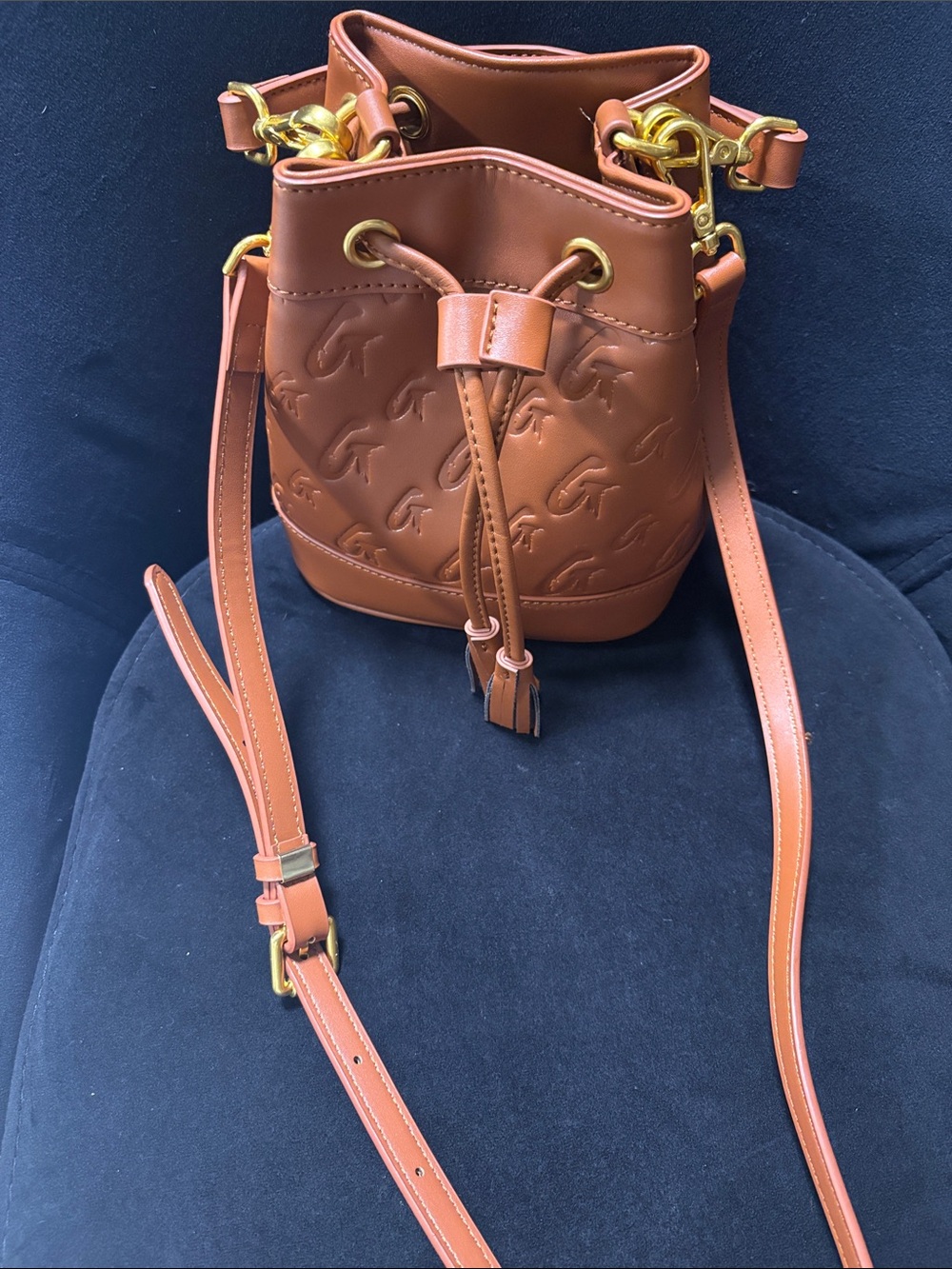 Embossed Monogram Drawstring Bucket Bag - Tan